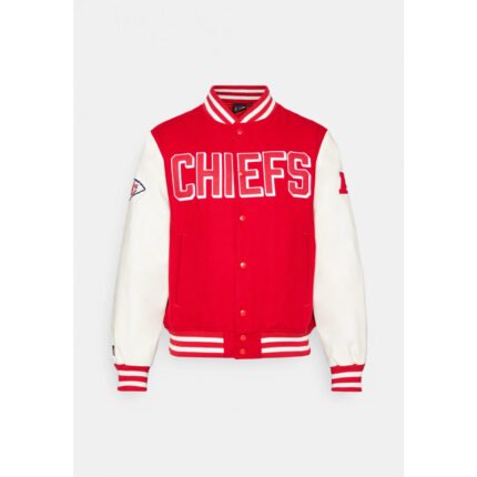 Model wearing red and gold Kansas City varsity jacket with chenille "KC" chest patch and Chiefs-inspired design